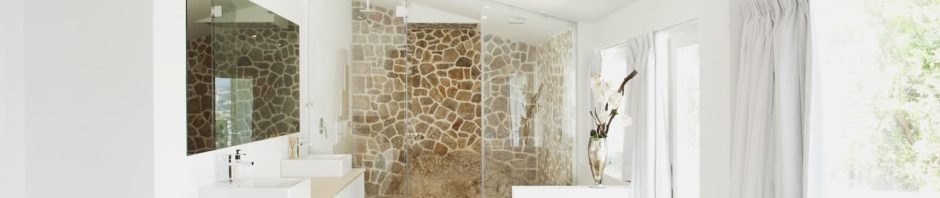 Bathroom pony wall ideas, also known as half walls or knee walls, offer a unique and practical design element in bathroom spaces.